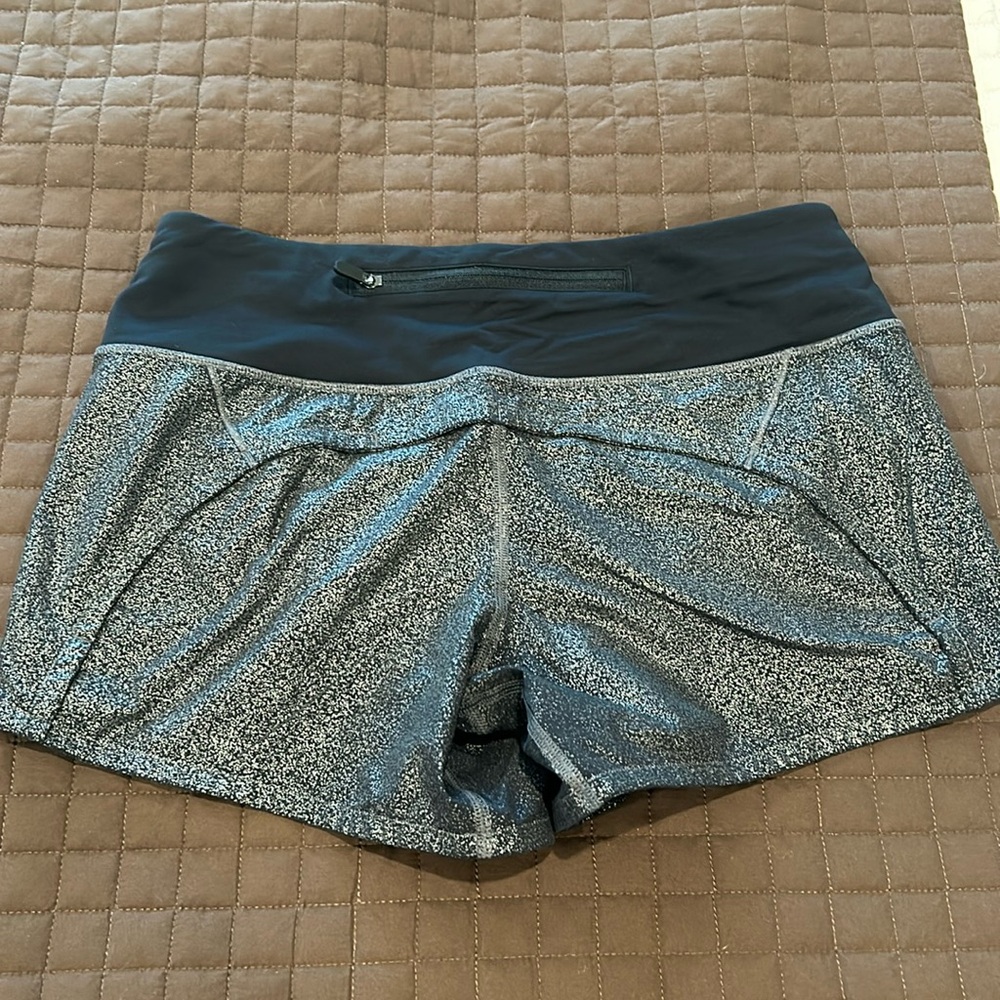 Women’s lululemon speed up short in silver shine. Size 4